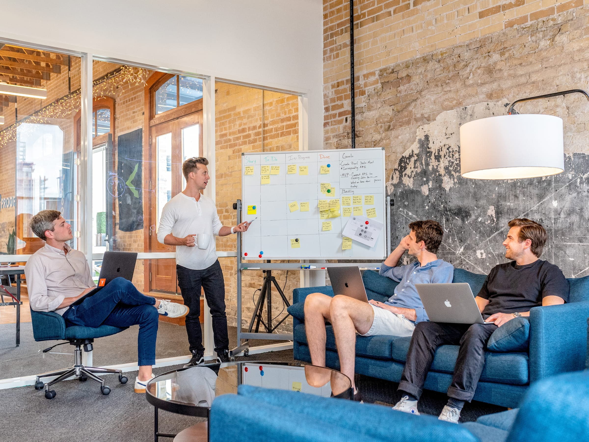 A team working together around a whiteboard