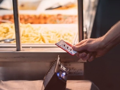 Person scanning for a meal using OurCrew